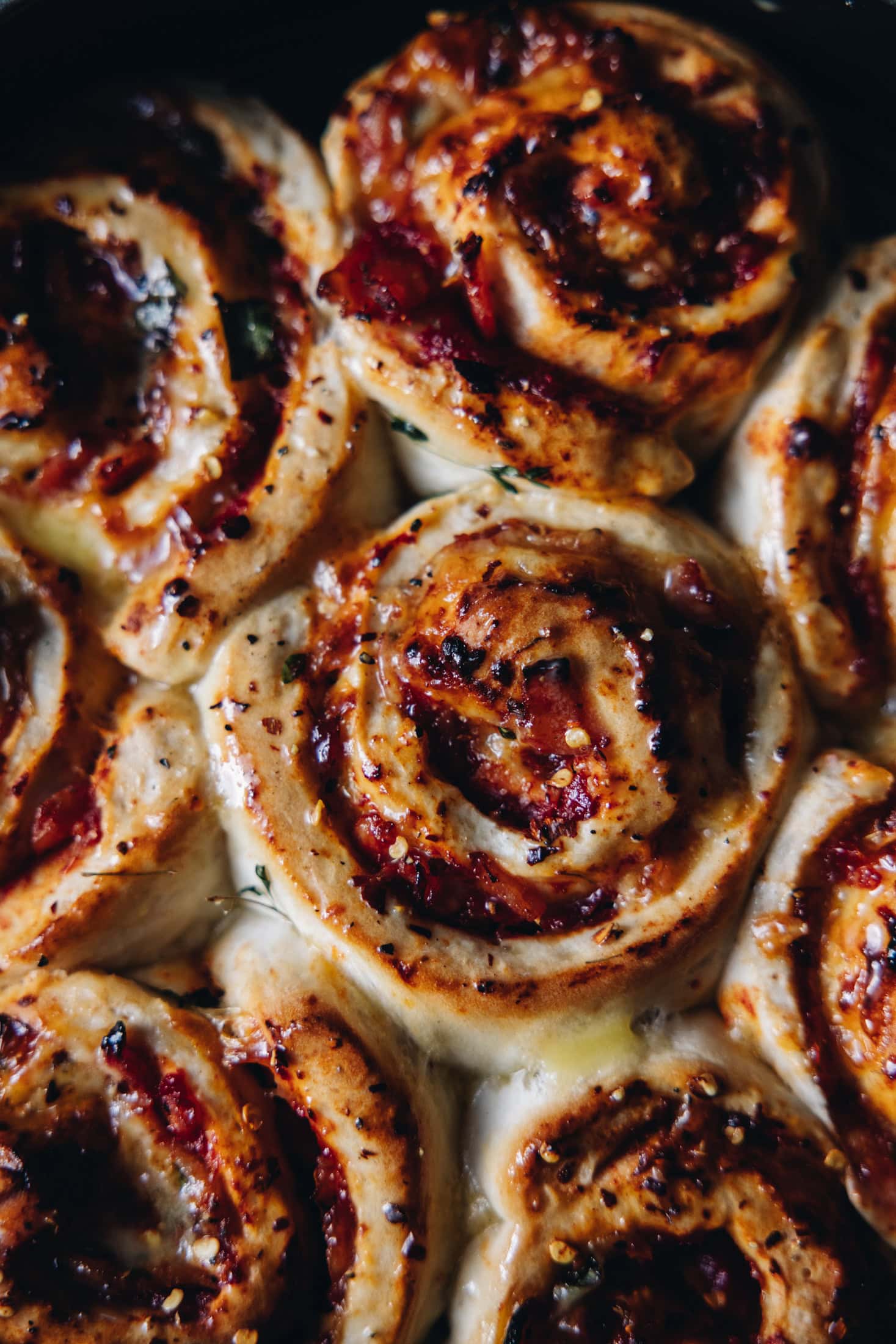Close up of Cheese and Tomato Scrolls that are freshly baked.